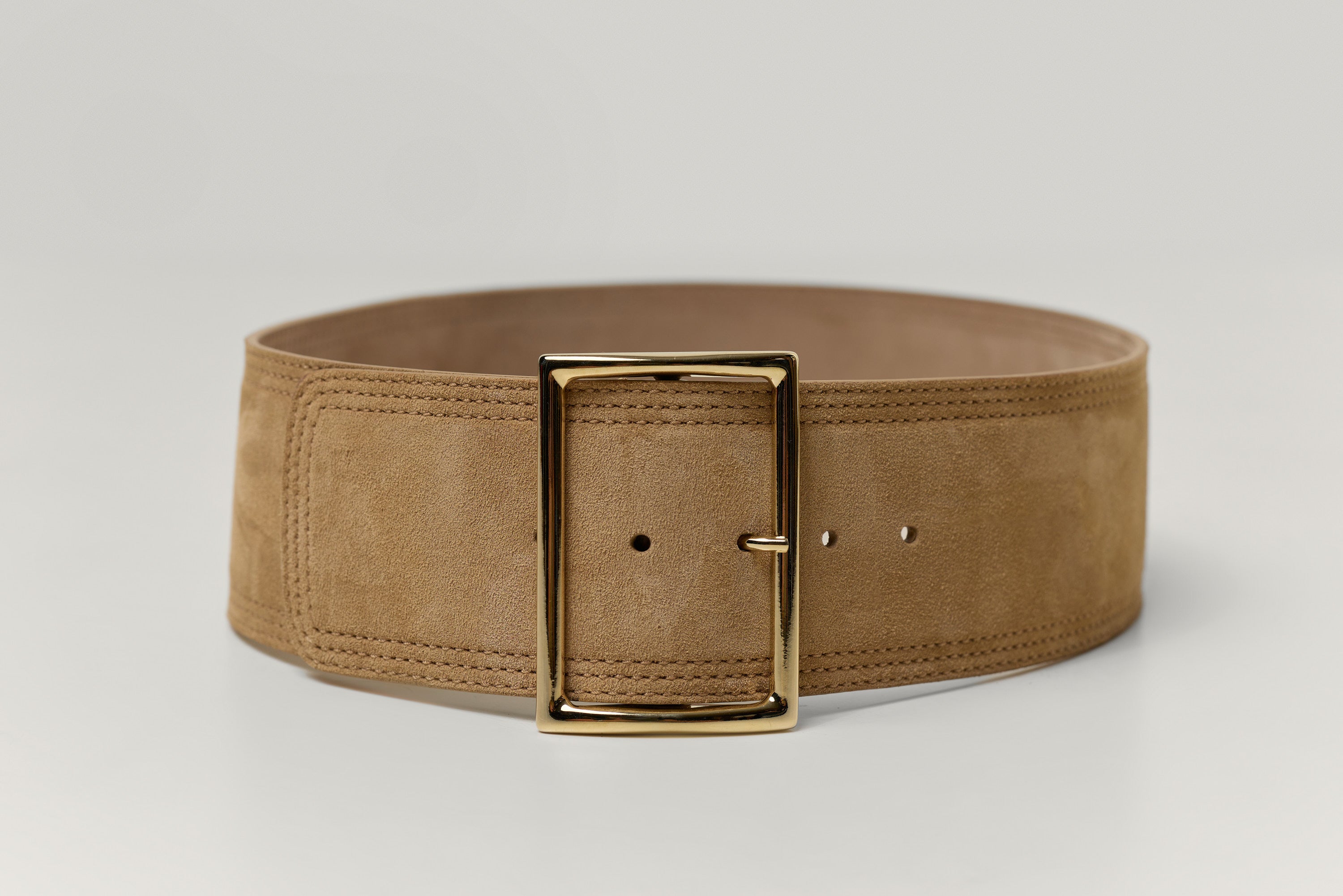 Wide curved suede belt
